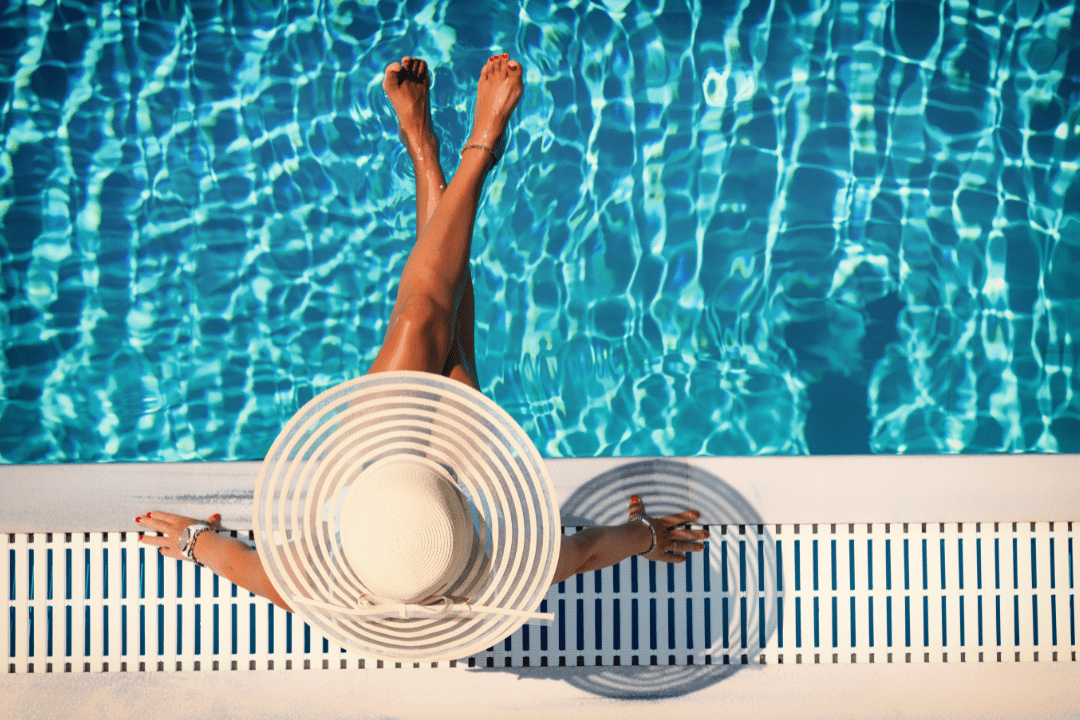 summer vacation. Girl in a swimming pool