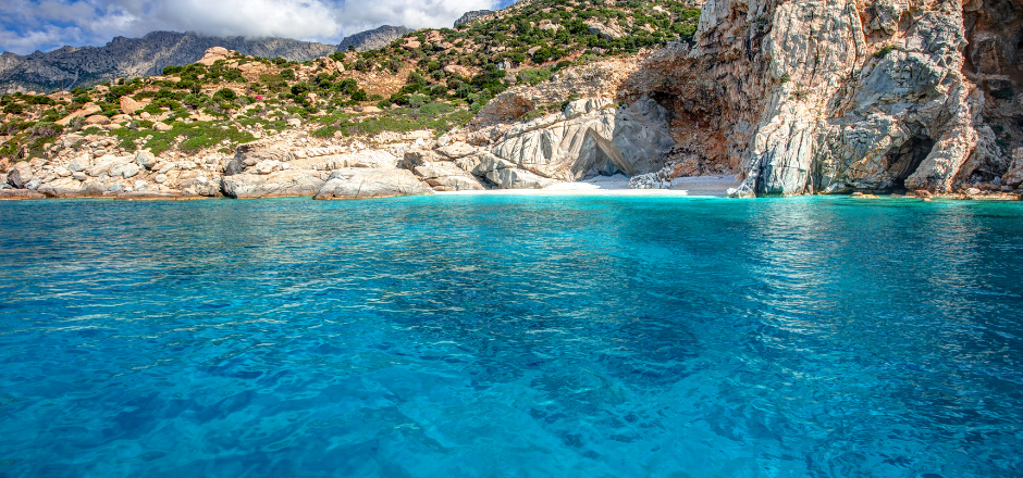 The beach of Seychelles, with transparent turquoise waters, in Ikaria island, Greece